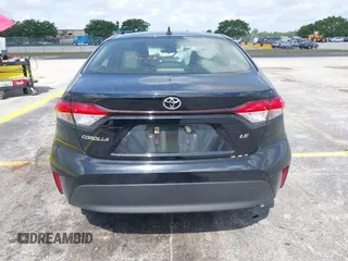2023 Toyota Corolla LE with VIN JTDB4MEE2PJ004869, listed as a IAAI auction lot 42139964 with 41,119 mi miles. Bid and sale history available at carsss.com. Image 16.