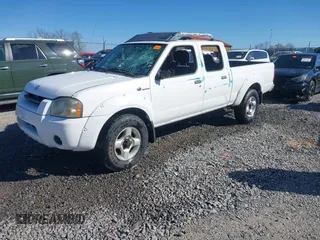 2002 Nissan Frontier SC with VIN 1N6MD29Y22C365773, listed as a IAAI auction lot 41910589 with 112,055 mi miles and . Bid and sale history available at DreamBid. Image 2.