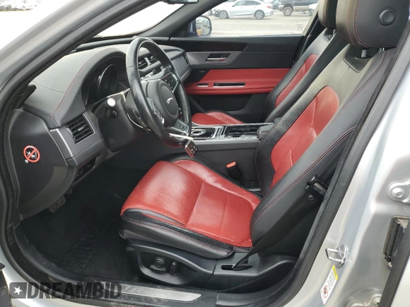 2016 Jaguar XF with VIN SAJBL4BV6GCY16964, listed as a Copart auction lot 82786584 with 100,587 mi miles and Salvage Title. Bid and sale history available at DreamBid. Image 7.
