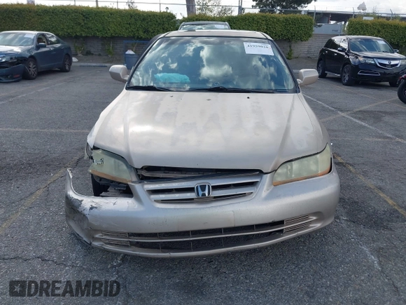 2001 Honda Accord EX z VIN 1HGCG66821A084618, wystawiony jako IAAI lot #41959020 z przebiegiem 272 671 mil mil oraz . Historia ofert i sprzedaży dostępna na DreamBid. Obrazek 12.