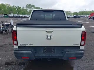 2019 Honda Ridgeline RTL-E with VIN 5FPYK3F75KB020713, listed as a IAAI auction lot 42191152 with 31,245 mi miles and . Bid and sale history available at DreamBid. Image 16.