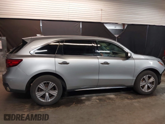 2020 Acura MDX with VIN 5J8YD4H32LL026682, listed as a IAAI auction lot 41977292 with 80,009 mi miles and . Bid and sale history available at DreamBid. Image 14.