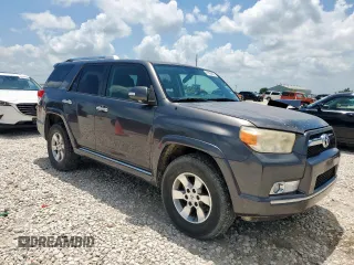 2011 Toyota 4Runner SR5 with VIN JTEZU5JRXB5019257, listed as a Copart auction lot 61050695 with 209,865 mi miles and Clean title. Bid and sale history available at DreamBid. Image 4.