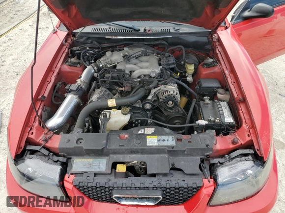 2004 Ford Mustang Standard with VIN 1FAFP40644F198897, listed as a Copart auction lot 47007415 with 129,067 mi miles and Salvage title. Bid and sale history available at DreamBid. Image 11.