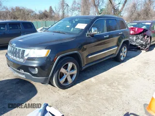 2011 Jeep Grand Cherokee Overland with VIN 1J4RS6GGXBC659349, listed as a IAAI auction lot 41778399 with 219,624 mi miles and . Bid and sale history available at DreamBid. Image 2.