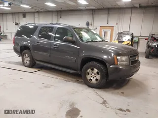 2010 Chevrolet Suburban LT with VIN 1GNUKJE36AR139025, listed as a IAAI auction lot 41311327 with 201,955 mi miles. Bid and sale history available at carsss.com. Image 1.