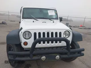 2013 Jeep Wrangler Sport z VIN 1C4AJWAG9DL653348, wystawiony jako IAAI lot #42096860 z przebiegiem 55 575 mil mil oraz . Historia ofert i sprzedaży dostępna na DreamBid. Obrazek 12.