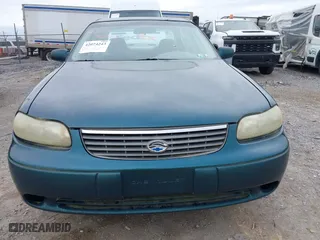 1998 Chevrolet Malibu with VIN 1G1ND52M8WY142896, listed as a IAAI auction lot 42074243 with 118,401 mi miles. Bid and sale history available at carsss.com. Image 6.