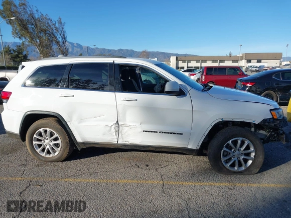 2021 Jeep Grand Cherokee Laredo X with VIN 1C4RJEAG2MC719395, listed as a IAAI auction lot 41338484 with 99,636 mi miles and . Bid and sale history available at DreamBid. Image 13.