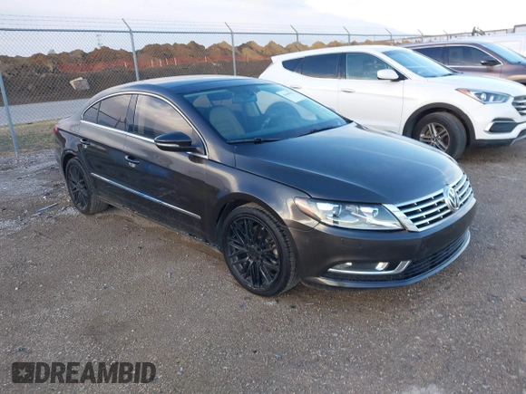 2015 Volkswagen CC Lux with VIN WVWRP7AN9FE819154, listed as a IAAI auction lot 41669832 with 151,142 mi miles. Bid and sale history available at carsss.com. Image 1.