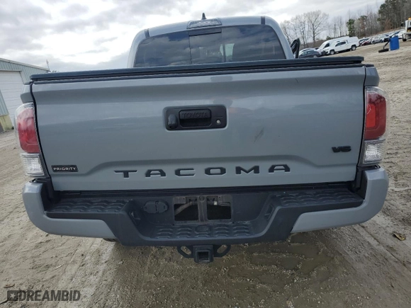 2021 Toyota Tacoma 4WD SR with VIN 3TMCZ5AN5MM385102, listed as a Copart auction lot 49399545 with 65,979 mi miles and Salvage Title. Bid and sale history available at carsss.com. Image 6.