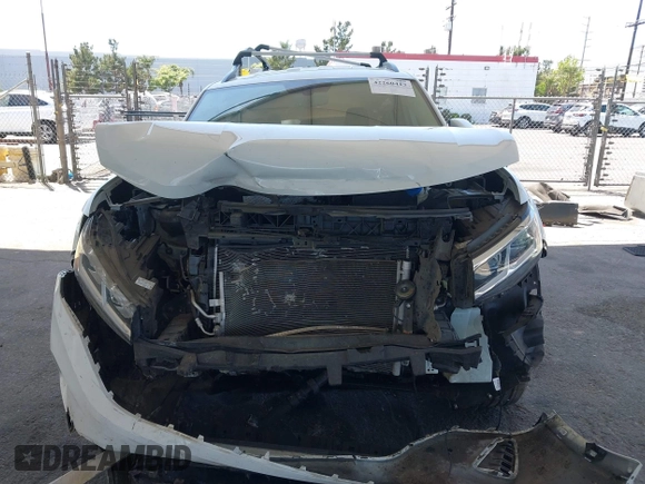 2021 Volkswagen Atlas SE z VIN 1V2HR2CA8MC514027, wystawiony jako IAAI lot #42260413 z przebiegiem 37 687 mil mil oraz . Historia ofert i sprzedaży dostępna na DreamBid. Obrazek 12.