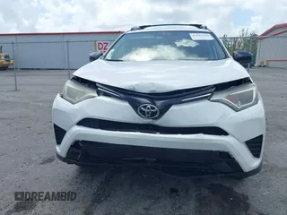 2016 Toyota RAV4 LE with VIN JTMZFREV2GJ096782, listed as a IAAI auction lot 41945319 with 76,866 mi miles. Bid and sale history available at carsss.com. Image 13.