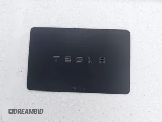 2020 Tesla Model 3 Standard Range Plus with VIN 5YJ3E1EA5LF613002, listed as a IAAI auction lot 42129085 with 55,672 mi miles. Bid and sale history available at carsss.com. Image 11.