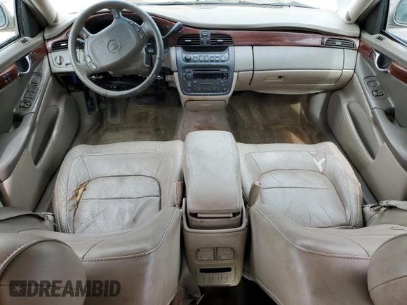 2004 Cadillac DeVille z VIN 1G6KD54Y64U134605, wystawiony jako Copart lot #56258215 z przebiegiem 256 662 mil mil oraz Szkody całkowita. Historia ofert i sprzedaży dostępna na DreamBid. Obrazek 8.