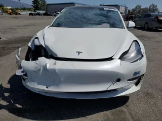 2021 Tesla Model 3 Long Range z VIN 5YJ3E1EB2MF007067, wystawiony jako Copart lot #52584715 z przebiegiem 31 311 mil mil oraz Szkoda całkowita • Salvage title. Historia ofert i sprzedaży dostępna na DreamBid. Obrazek 5.