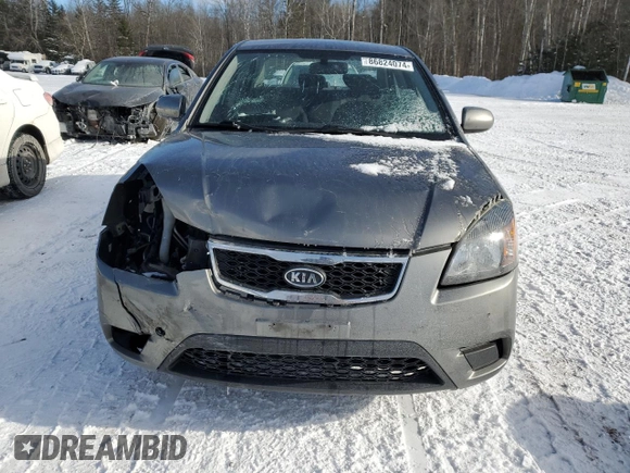 2011 Kia Rio with VIN KNADH4B32B6915325, listed as a Copart auction lot 86824074 with 167,410 mi miles and Salvage Title. Bid and sale history available at DreamBid. Image 5.