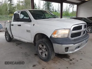 2014 Ram 1500 Tradesman z VIN 1C6RR7FGXES305972, wystawiony jako IAAI lot #42149659 z przebiegiem 163 374 mil mil oraz . Historia ofert i sprzedaży dostępna na DreamBid. Obrazek 1.