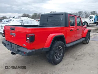 2022 Jeep Gladiator High Altitude with VIN 1C6HJTFG0NL105043, listed as a IAAI auction lot 41290790 with 73,595 mi miles and . Bid and sale history available at DreamBid. Image 4.