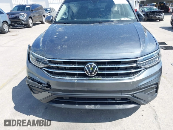 2023 Volkswagen Tiguan SE z VIN 3VVNB7AX5PM064693, wystawiony jako IAAI lot #42033011 z przebiegiem 38 220 mil mil oraz . Historia ofert i sprzedaży dostępna na DreamBid. Obrazek 12.