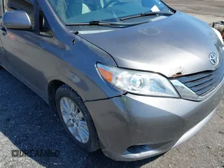 2011 Toyota Sienna LE with VIN 5TDJK3DC1BS016258, listed as a IAAI auction lot 41995140 with 200,903 mi miles. Bid and sale history available at carsss.com. Image 17.