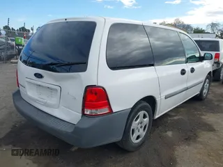 2006 Ford Freestar Cargo with VIN 2FTZA54626BA64158, listed as a IAAI auction lot 41414300 with 196,612 mi miles. Bid and sale history available at carsss.com. Image 4.