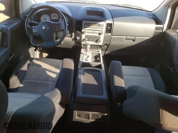 2011 Nissan Titan Pro-4X с VIN 1N6BA0ECXBN300561, выставлен на аукционе Copart как лот 85480484 с пробегом 158 547 миль миль и Списание • Salvage title. История ставок и продаж доступна на DreamBid. Изображение 8.