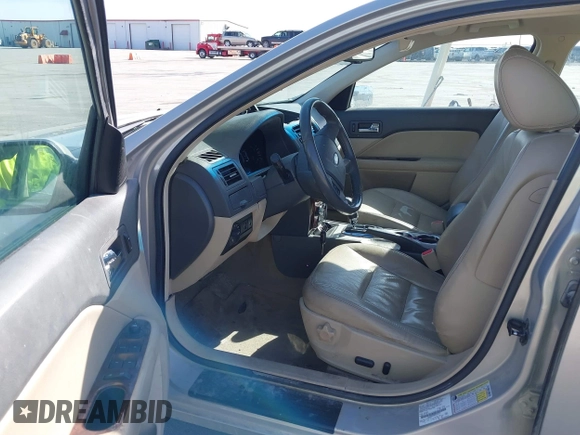 2010 Ford Fusion SEL with VIN 3FAHP0JG8AR255772, listed as a IAAI auction lot 41704257 with 169,547 mi miles. Bid and sale history available at carsss.com. Image 5.