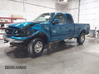 2000 Ford F-150 XL z VIN 1FTRX18L7YKB27657, wystawiony jako IAAI lot #42262373 z przebiegiem Nie podano mil oraz . Historia ofert i sprzedaży dostępna na DreamBid. Obrazek 17.