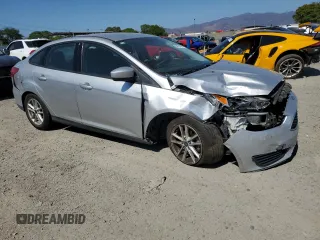 2018 Ford Focus SE with VIN 1FADP3F25JL324753, listed as a Copart auction lot 58624995 with 129,127 mi miles and Salvage title. Bid and sale history available at DreamBid. Image 4.