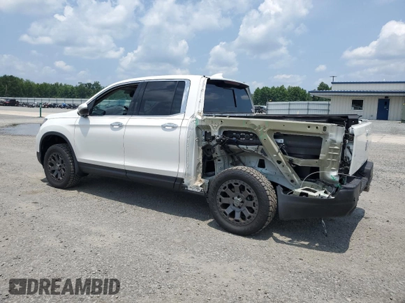 2023 Honda Ridgeline RTL-E with VIN 5FPYK3F7XPB027874, listed as a Copart auction lot 63771315 with 11,945 mi miles and Salvage title. Bid and sale history available at DreamBid. Image 2.