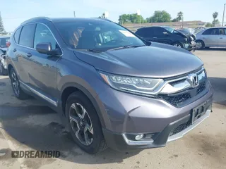 2018 Honda CR-V Touring with VIN 7FARW1H93JE027294, listed as a IAAI auction lot 41903484 with 80,999 mi miles and . Bid and sale history available at carsss.com. Image 1.