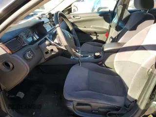 2015 Chevrolet Impala LT with VIN 2G1WB5E38F1163618, listed as a Copart auction lot 87698515 with 105,415 mi miles and Salvage Title. Bid and sale history available at DreamBid. Image 7.