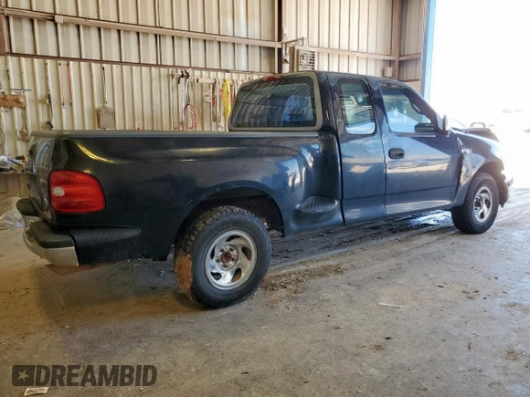 1998 Ford F-150 XL with VIN 1FTZX0725WKB83760, listed as a Copart auction lot 60988225 with 243,361 mi miles and Salvage title. Bid and sale history available at DreamBid. Image 3.