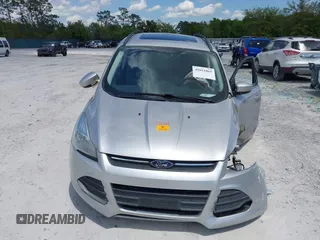 2016 Ford Escape SE with VIN 1FMCU9G92GUC28879, listed as a IAAI auction lot 42021065 with 99,184 mi miles. Bid and sale history available at carsss.com. Image 12.