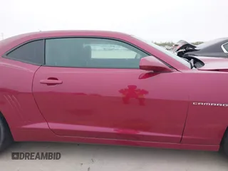 2014 Chevrolet Camaro LT z VIN 2G1FC1E3XE9317459, wystawiony jako IAAI lot #41168805 z przebiegiem 126 298 mil mil oraz . Historia ofert i sprzedaży dostępna na DreamBid. Obrazek 14.