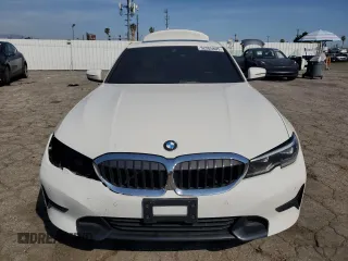 2021 BMW 3 Series 330i with VIN 3MW5R1J0XM8C09626, listed as a Copart auction lot 52205805 with 52,261 mi miles and Salvage title. Bid and sale history available at DreamBid. Image 5.