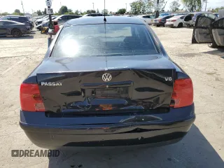 2000 Volkswagen Passat GLS z VIN WVWMD23B0YP307525, wystawiony jako Copart lot #57040775 z przebiegiem 167 440 mil mil oraz Szkoda całkowita • Salvage title. Historia ofert i sprzedaży dostępna na DreamBid. Obrazek 6.