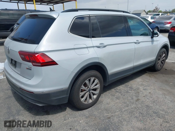 2018 Volkswagen Tiguan SEL with VIN 3VV2B7AX8JM105246, listed as a IAAI auction lot 41906838 with 110,749 mi miles and . Bid and sale history available at DreamBid. Image 4.