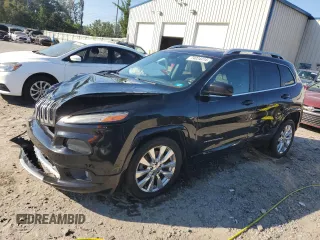 2016 Jeep Cherokee Overland with VIN 1C4PJLJS9GW297855, listed as a Copart auction lot 74024414 with 163,578 mi miles and Salvage title. Bid and sale history available at DreamBid. Image 1.