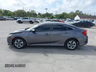 2018 Honda Civic Sedan LX with VIN 19XFC2F59JE044099, listed as a IAAI auction lot 41719337 with 44,534 mi miles. Bid and sale history available at carsss.com. Image 14.