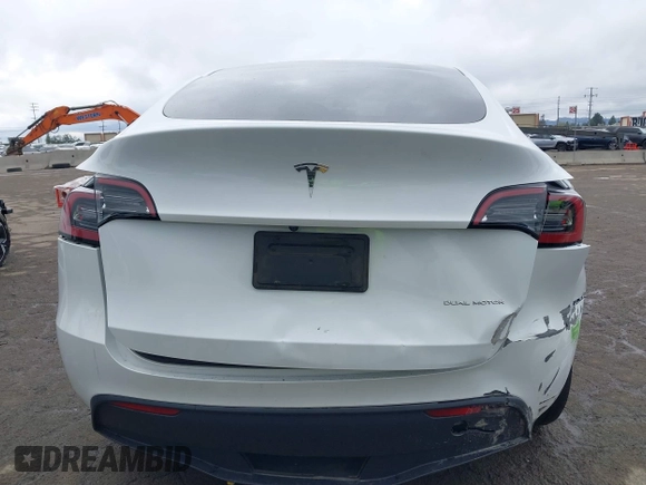 2023 Tesla Model Y Long Range with VIN 7SAYGDEE1PA106057, listed as a IAAI auction lot 41778642 with 1 mi miles. Bid and sale history available at carsss.com. Image 17.