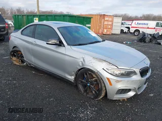 2016 BMW 2 Series M235i with VIN WBA1J7C54GV359301, listed as a IAAI auction lot 41186271 with 97,671 mi miles. Bid and sale history available at carsss.com. Image 1.