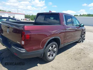 2019 Honda Ridgeline RTL-E with VIN 5FPYK3F72KB031085, listed as a IAAI auction lot 42236249 with 73,612 mi miles and . Bid and sale history available at DreamBid. Image 4.