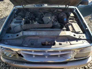 1996 Ford Explorer XL z VIN 1FMDU34X4TZA70403, wystawiony jako Copart lot #76780834 z przebiegiem 131 020 mil mil oraz Tytuł czysty. Historia ofert i sprzedaży dostępna na DreamBid. Obrazek 11.