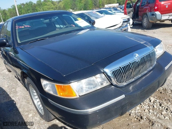 1999 Mercury Grand Marquis LS with VIN 2MEFM75W5XX727746, listed as a IAAI auction lot 41464968 with 216,271 mi miles. Bid and sale history available at carsss.com. Image 1.