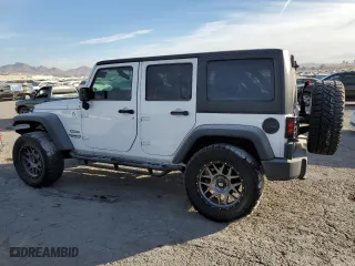 2012 Jeep Wrangler Unlimited Sport with VIN 1C4HJWDGXCL268227, listed as a Copart auction lot 86121234 with 137,585 mi miles and Salvage Title. Bid and sale history available at carsss.com. Image 2.