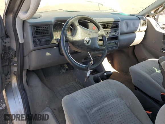2000 Volkswagen EuroVan с VIN WV2MH4701YH133906, выставлен на аукционе Copart как лот 72370794 с пробегом Не указан миль и Чистый • Clean title. История ставок и продаж доступна на DreamBid. Изображение 8.