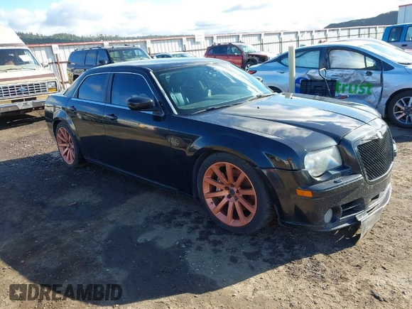 2006 Chrysler 300 C SRT8 with VIN 2C3LA73W06H370568, listed as a IAAI auction lot 41982346 with 133,209 mi miles. Bid and sale history available at carsss.com. Image 1.