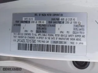 2013 Mazda Mazda5 Grand Touring with VIN JM1CW2DL7D0157980, listed as a IAAI auction lot 42114014 with 201,562 mi miles. Bid and sale history available at carsss.com. Image 9.